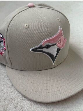 New Era Beige Baseball Cap with Pink Logo Accent
